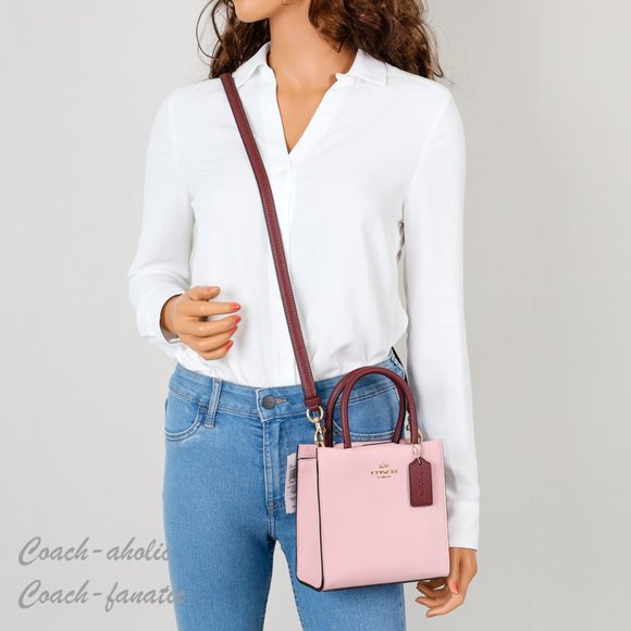 Coach Handbags - NWT Coach CE598 Mini Cally Leather Crossbody in Powder Pink/Wine